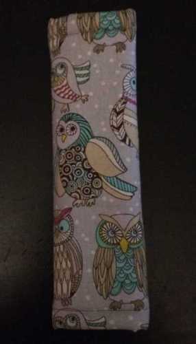 Cloth covered seat belt cover